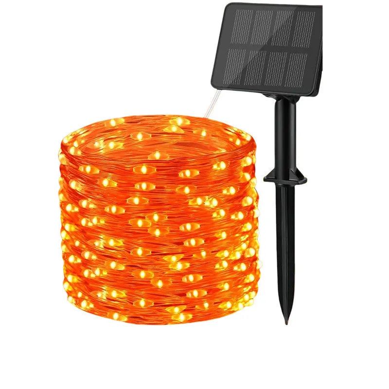 Waterproof solar Christmas courtyard lamp in purple or orange with cartoon modelling for holiday decoration