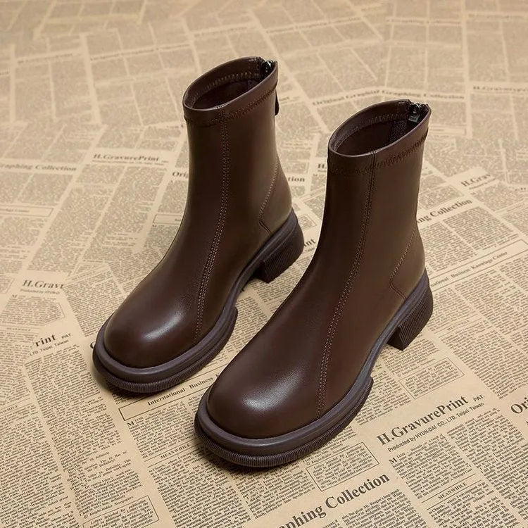 Women's black flat heel ankle boots with back zipper and round toe