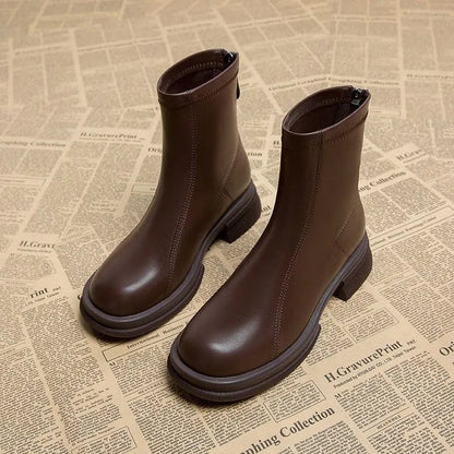 Women's black flat heel ankle boots with back zipper and round toe