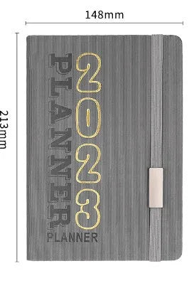 Creative student almanac calendar with imitation leather cover open to show weekly layout