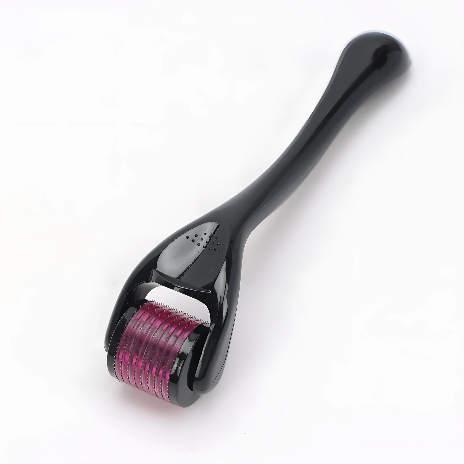 Sterile micro needle derma roller with black handle and coloured wheel on white background