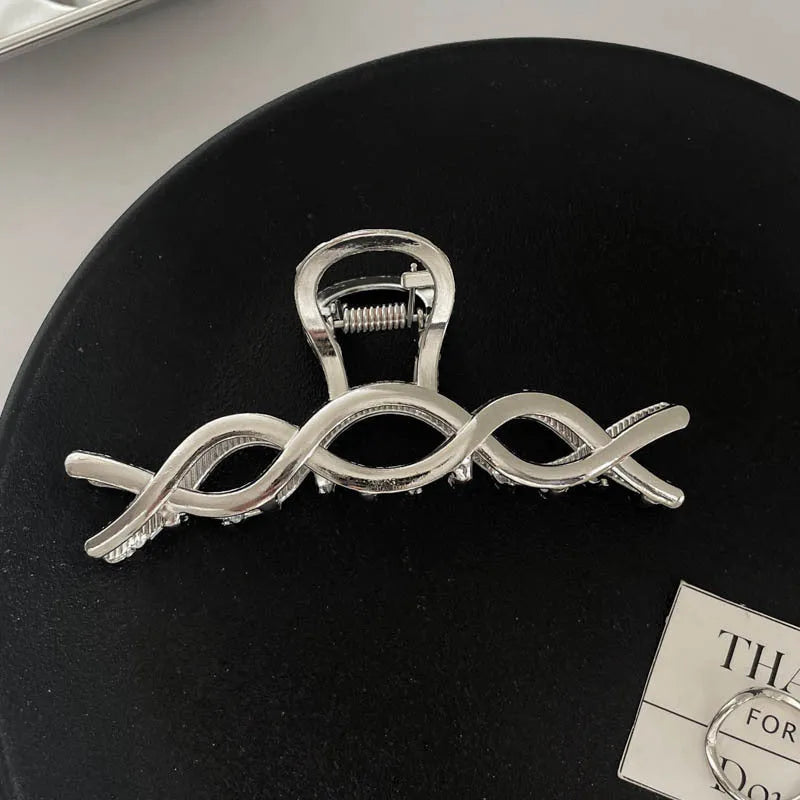 Silver metal hair claw barrette example from a range of 44 Korean-style designs.