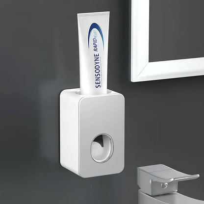 Black wall-mounted automatic toothpaste dispenser with 1 ml pump, punch-free adhesive, 18 cm height for bathroom use