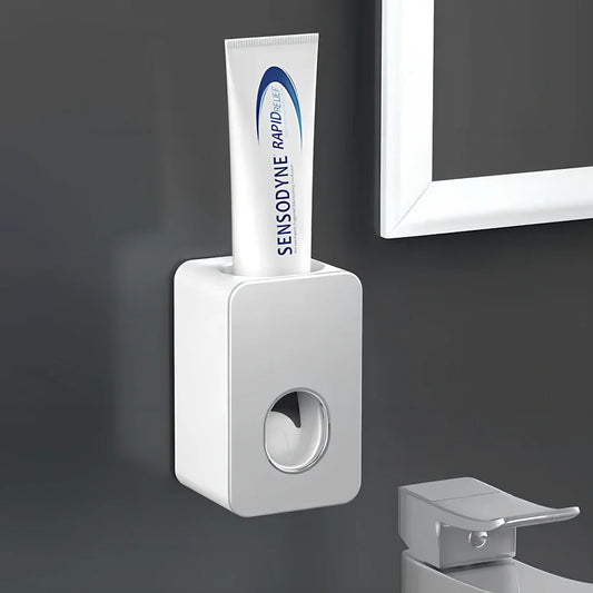 Black wall-mounted automatic toothpaste dispenser with 1 ml pump, punch-free adhesive, 18 cm height for bathroom use