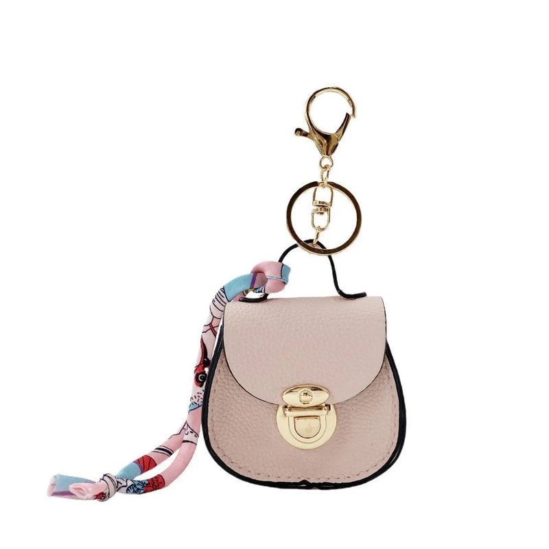 Coin purse keychain pendant multifunctional small bag with six colour options including saddle bag black, orange, brown, big red, grey and pink made from ultra-lightweight PVC material for minimal storage needs