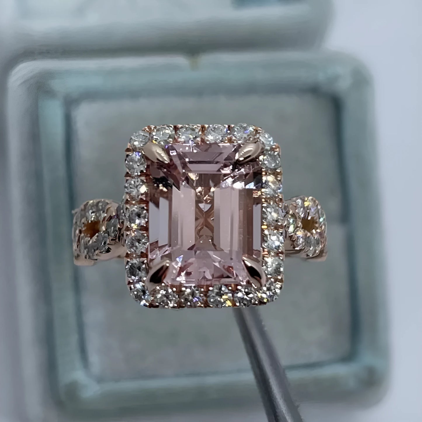 Rose gold geometric alloy ring showing electroplated finish and structured shape.