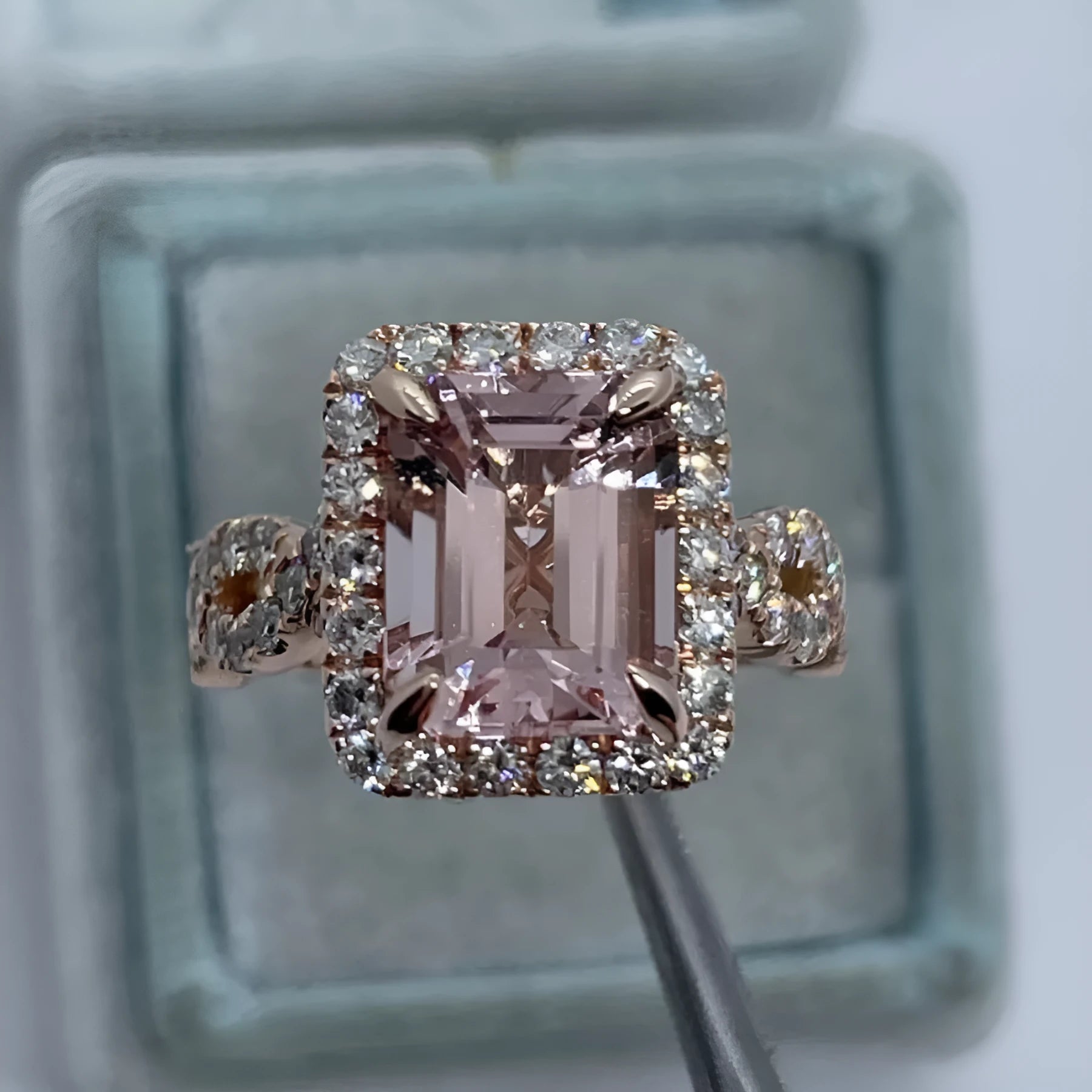 Rose gold geometric alloy ring showing electroplated finish and structured shape.