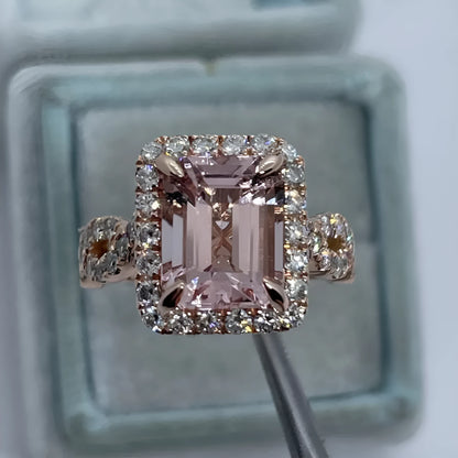 Rose gold geometric alloy ring showing electroplated finish and structured shape.