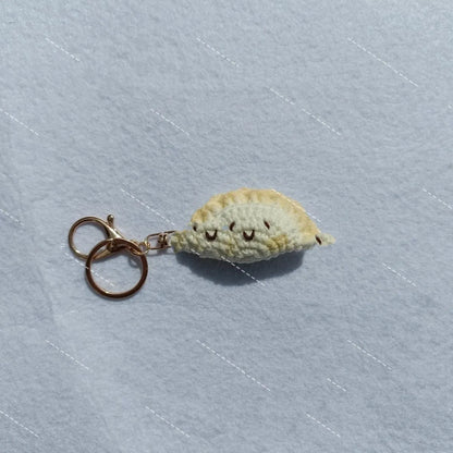Handmade crochet dumpling pendant with keychain in plush fabric