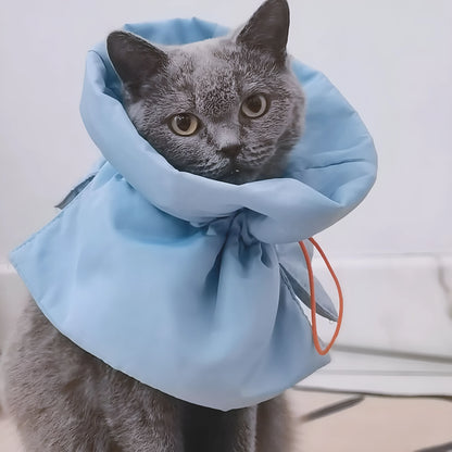 Soft adjustable Elizabethan recovery collar for a cat or small dog in blue, grey, green, or pink.