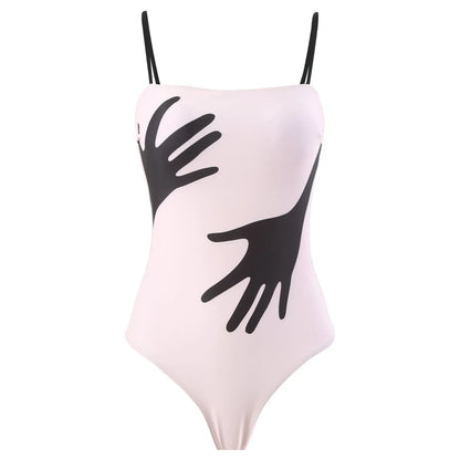 Women's one-piece bikini swimsuit with a white tulle skirt overlay on a mannequin.
