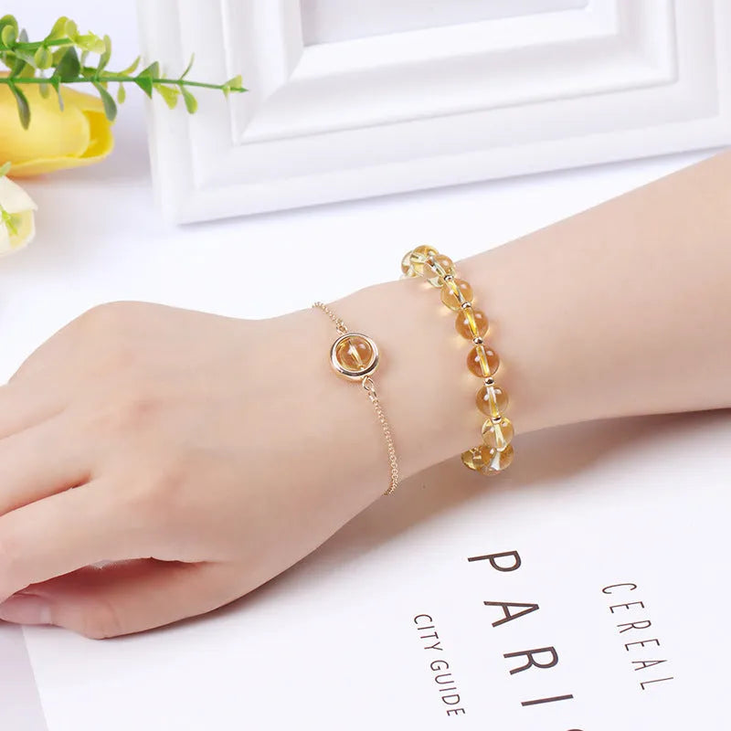 Double-layer women's bracelet with lucky beads and colourful crystals in gold-toned setting
