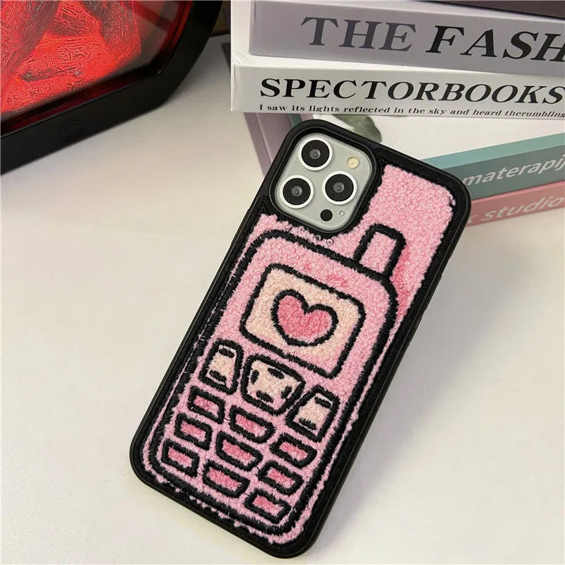 Pink iPhone back cover case with embroidered towel texture design for iPhone models X through 15 Pro Max.