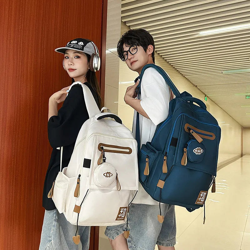 Large capacity waterproof nylon leisure travel backpack with contrast stitching in multiple colour options