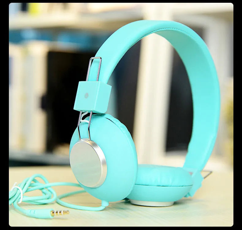 Wired over-ear sports headphones with a microphone, shown in multiple colour options on a white background.