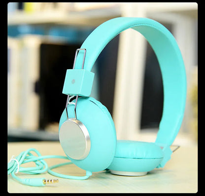 Wired over-ear sports headphones with a microphone, shown in multiple colour options on a white background.