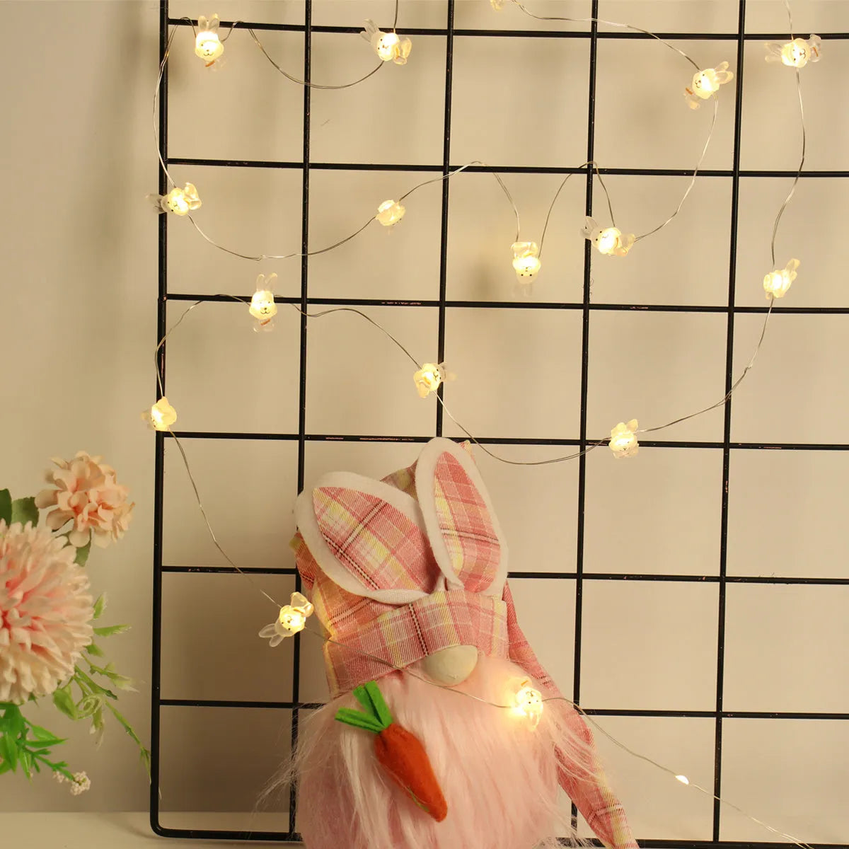Easter LED bunny string lights with carrot and transparent white rabbit shapes on flexible copper wire
