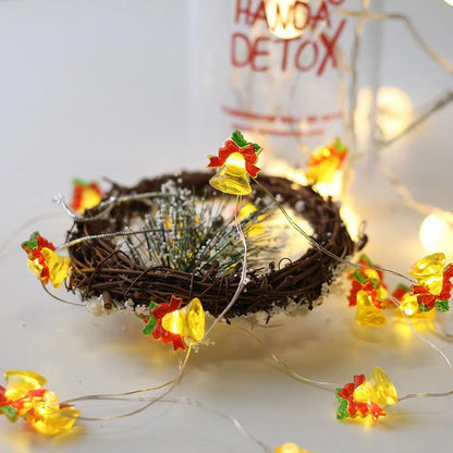 Copper wire LED Christmas decoration lights featuring festive designs like bells, trees, and elks