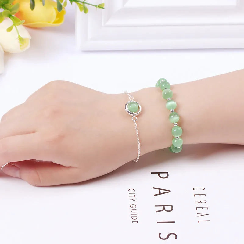 Double-layer women's bracelet with lucky beads and colourful crystals in gold-toned setting