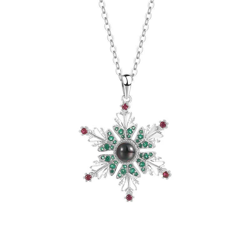Shimmering copper snowflake necklace with projection design, creating a mesmerizing holiday accessory