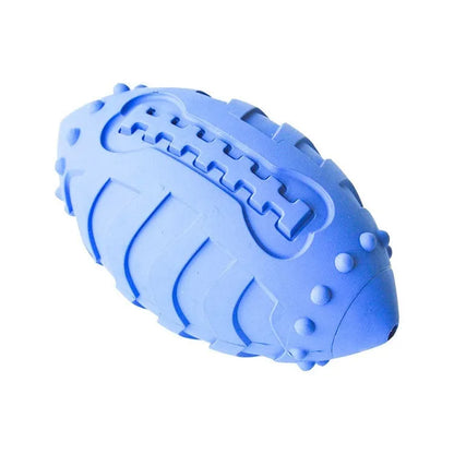 A light green thickened rubber rugby ball dog chew toy on a plain background.