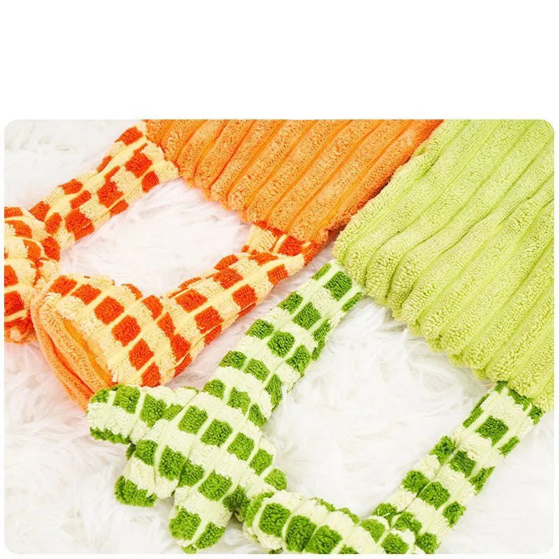 Green and orange immortal squeaker plush dog toy for aggressive chewers with dental cleaning surface