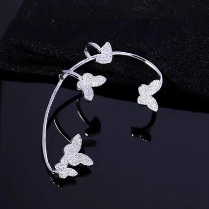 Elegant gold-plated butterfly ear cuffs with sparkling zircon accents, perfect for women's fashion and accessorizing