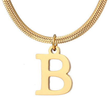 Elegant gold A-Z letter pendant necklace on a snake chain