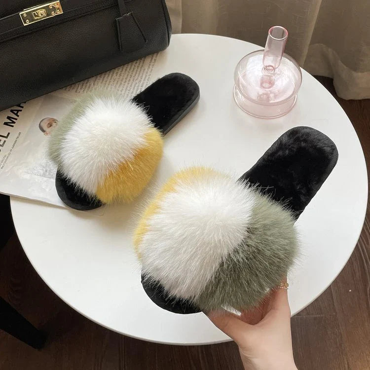 Cosy indoor furry slippers for British women, featuring plush lining, open-toe design, and trendy tassels in a range of classic UK colours.