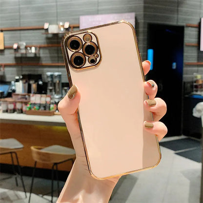 Gold-accented iPhone case with raised silicone stripes on a solid coloured TPU background.