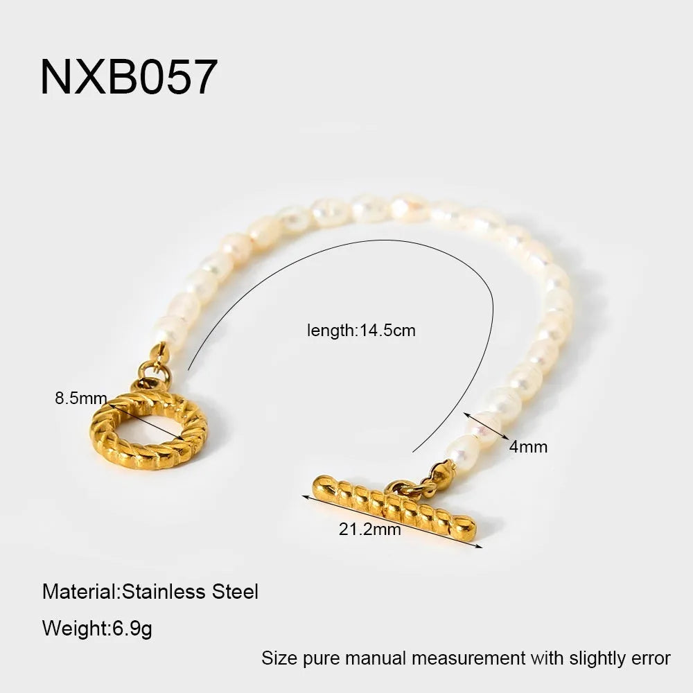 Freshwater pearl and stainless steel geometric pendant necklace with matching bracelet set.