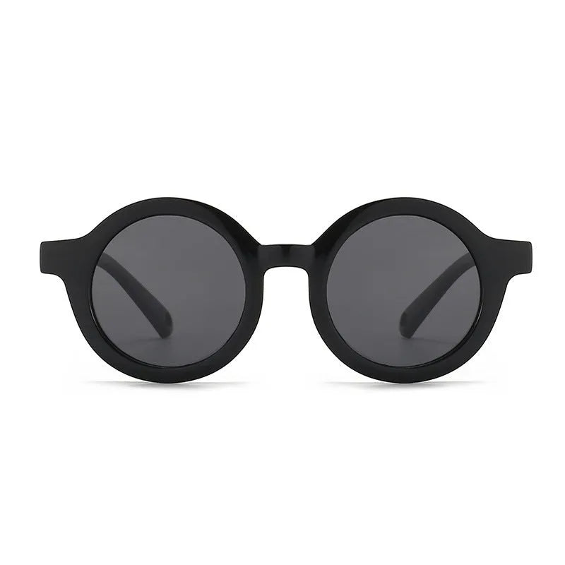 Children's round-frame polarised sunglasses with soft TPEE frame for ages 0-3, shown in assorted colours.