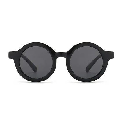Children's round-frame polarised sunglasses with soft TPEE frame for ages 0-3, shown in assorted colours.