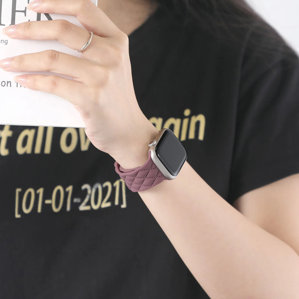 Silicone Apple Watch strap with butterfly buckle, shown in black, 38/40/41mm size