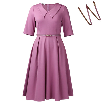 Women's solid colour African midi dress with half sleeves and a matching fabric belt.