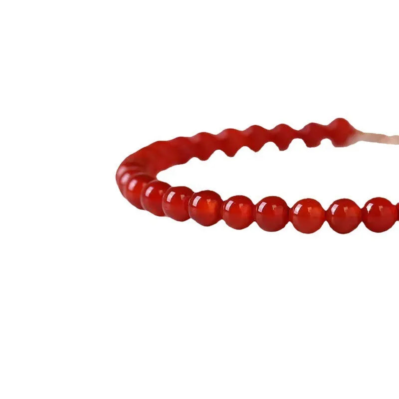 Ultra-thin red agate women's bracelet in classic style on wrist