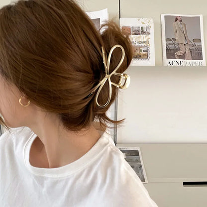 Alloy bow barrette hair grip in silver or gold colour for women's back-of-head styling