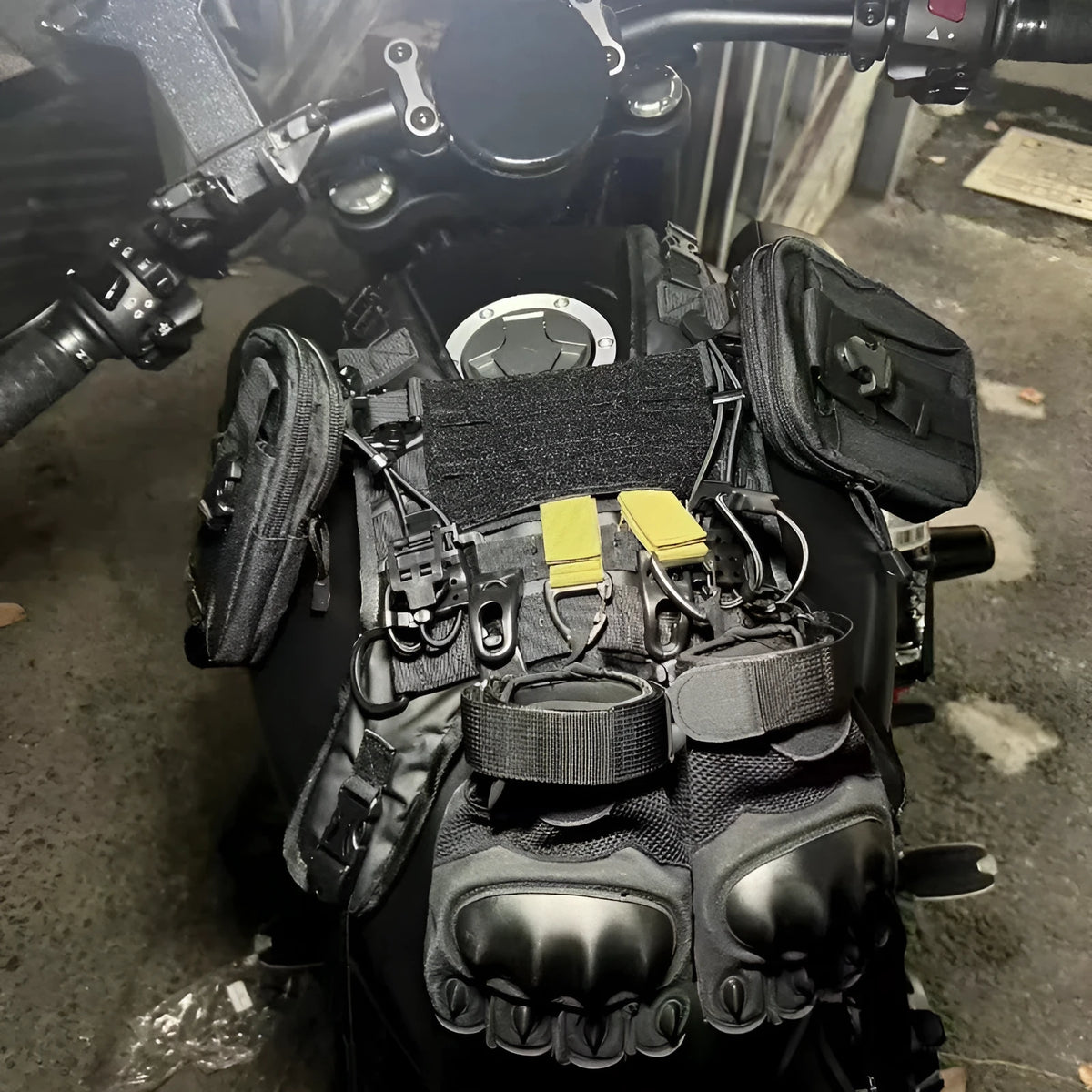 Universal black vest fuel tank bag mounting base for motorcycle tank bag, shown as a vest-style mount base