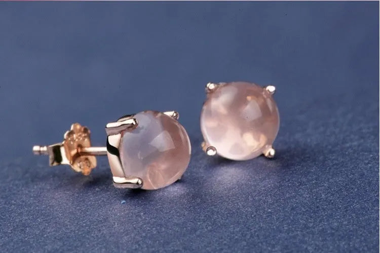 Women's simple Korean style drop shape stud earrings with synthetic ross quartz and rose gold finish.