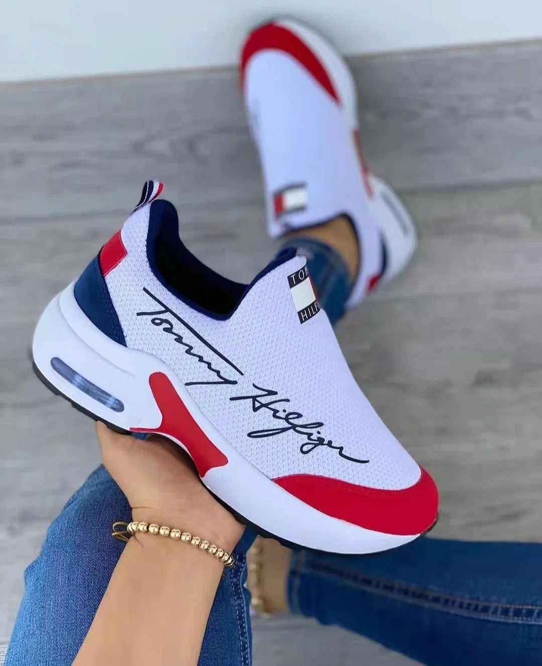Women's slip-on sneakers with air cushion and mid heel in white, red, black, navy blue