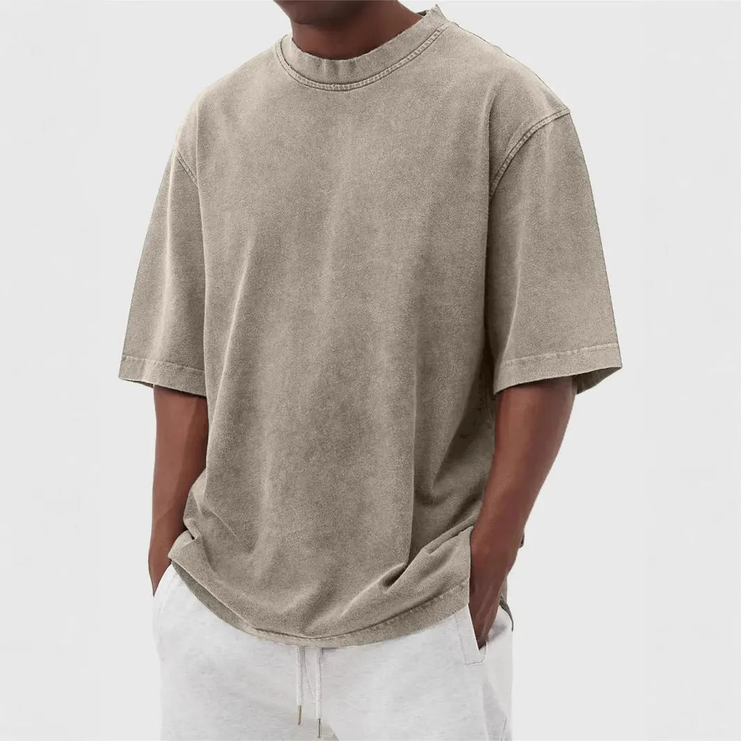 Men's loose fit stone-washed distressed short sleeve t-shirt in solid colour