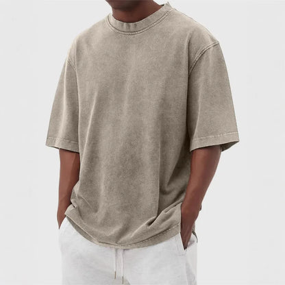 Men's loose fit stone-washed distressed short sleeve t-shirt in solid colour