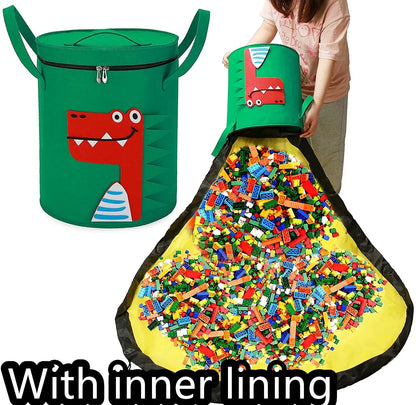 Green felt storage cube with pull rope, unfolded flat as a square play mat next to toys.
