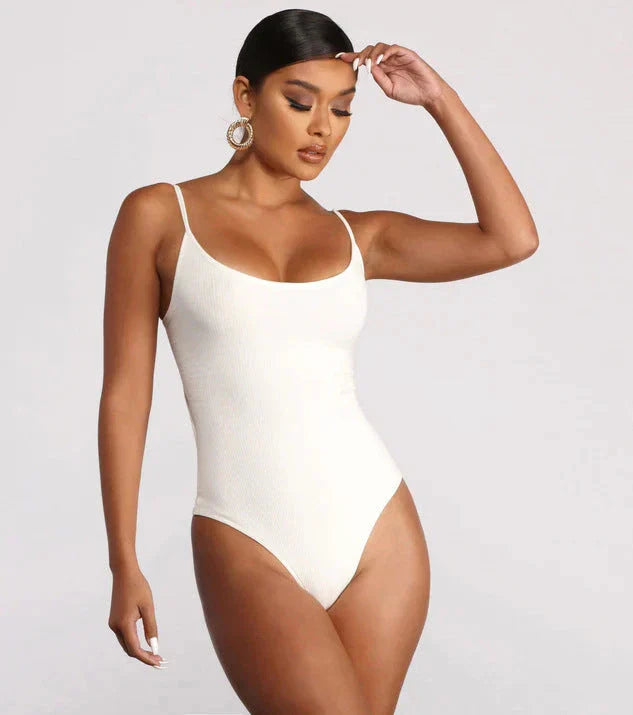 A stylish, backless one-piece swimsuit in a variety of vibrant colors for women's summer fashion.