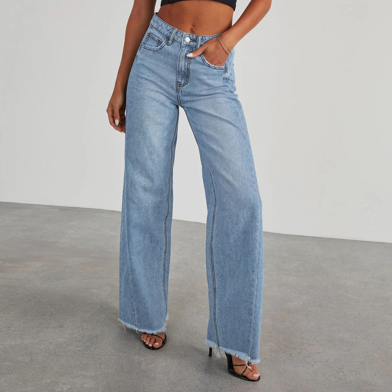 Premium high-rise denim jeans with pockets for women, available in classic colors with a comfortable, figure-flattering fit