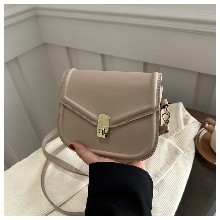 Soft PU leather messenger bag with textured finish in horizontal rectangular shape