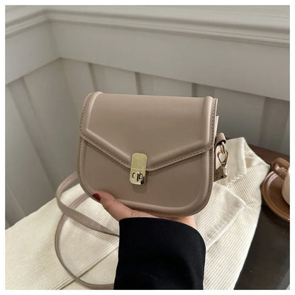 Soft PU leather messenger bag with textured finish in horizontal rectangular shape