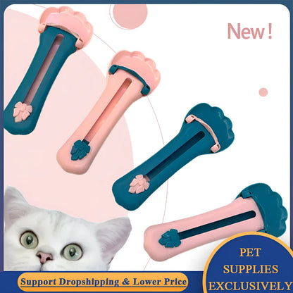 Green plastic pet food scoop with squeezer handle and dispensing nozzle for kibble and liquid.