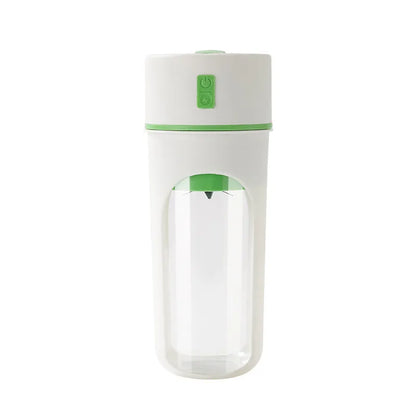 Blue portable USB rechargeable electric juicer blender with a large feed cap on a kitchen counter.