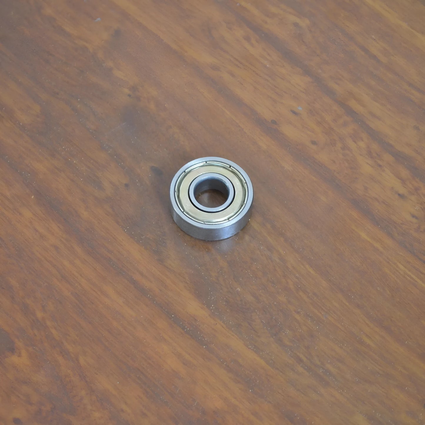 6000ZZ carbon steel ball bearing with 10x26x8mm dimensions and metal shields.